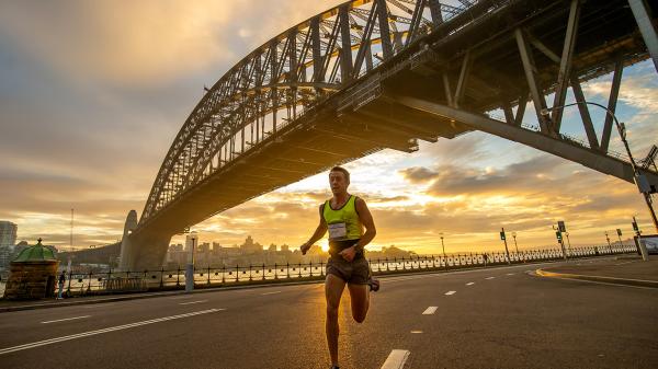 Sydney Half content male runner solo habour bridge
